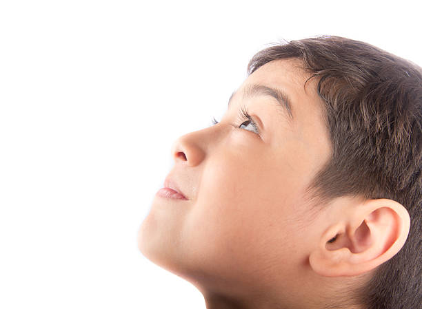 istock Little boy looking up with smiling 503272508