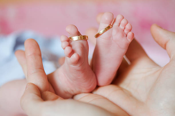 istock adorable newborn baby feet 503274120