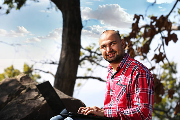 istock Men working on laptop Portrait in Nature 503274570