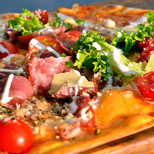 istock Pizza on wooden board 503274740