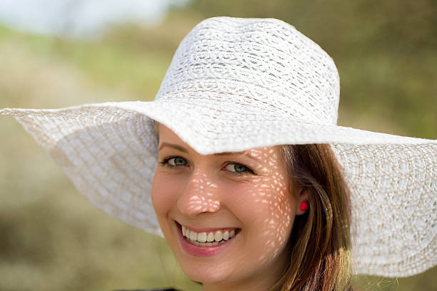istock cheerful fashionable woman with hat 503276236