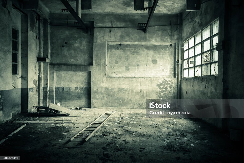 Abandoned room with broken window Spooky Stock Photo