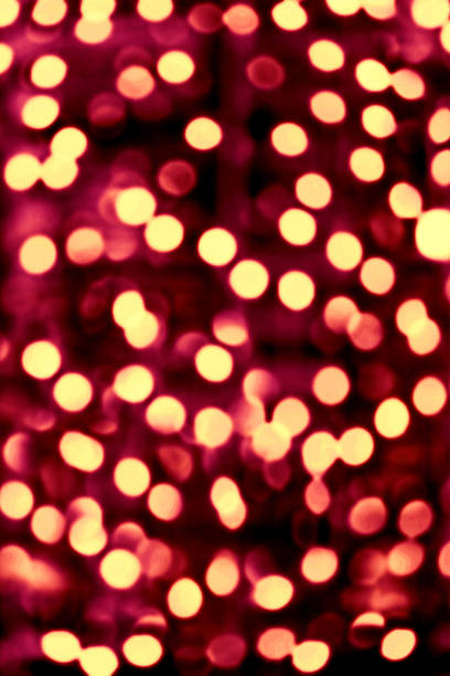 istock Abstract dark red background with gold circles. Sparkling bokeh 503278832