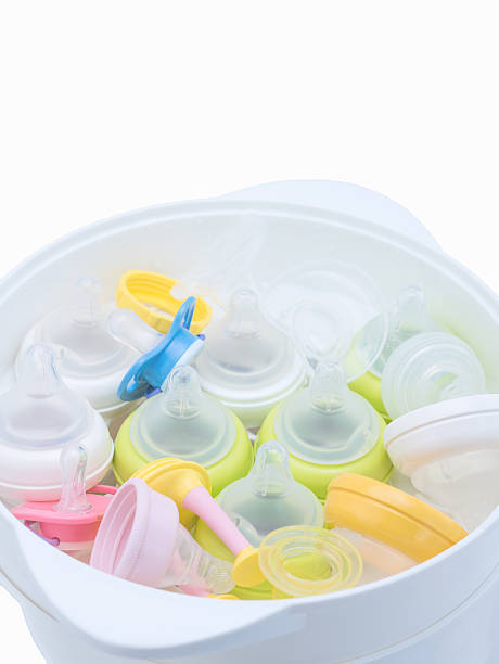 istock Nipples in steam sterilizer and dryer. 503278834