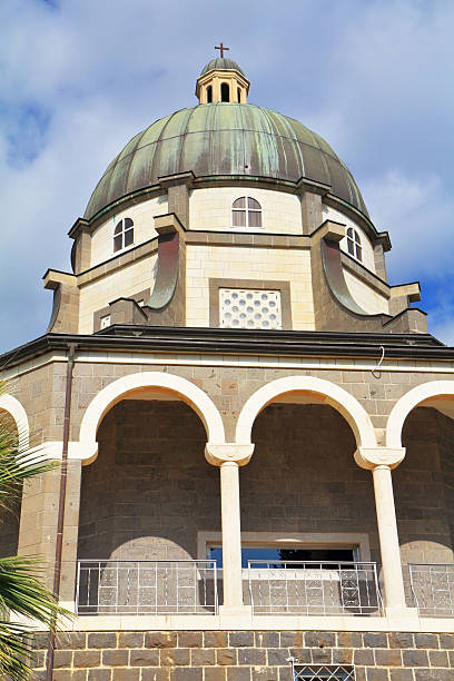 istock Basilica and colonnade, illuminated by the sun 503280482