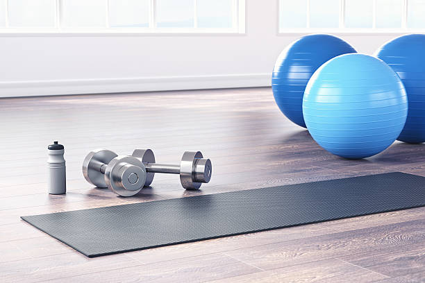 Healthy Lifestyle Fitness studio with fitness equipments. fitness ball photos stock pictures, royalty-free photos & images