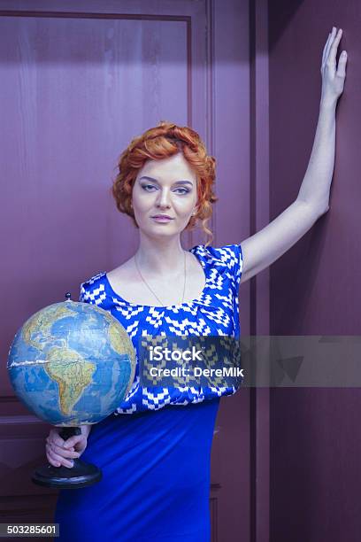 Girl Holding A World Globe Stock Photo - Download Image Now - Book, Librarian, Library