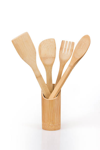 wooden kitchen utensils stock photo