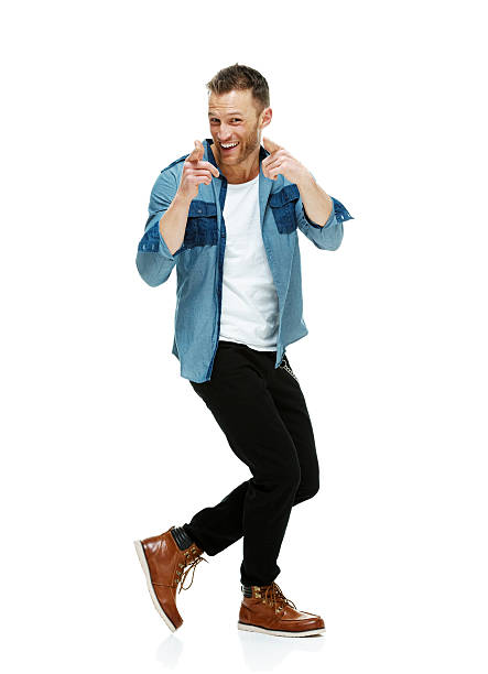 istock Cheerful hipster walking & pointing toward camera 503290593