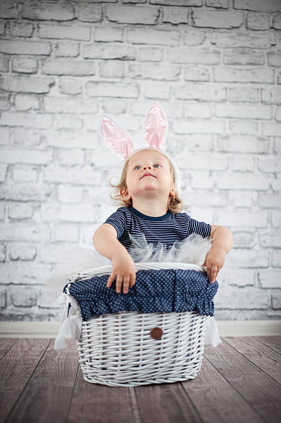 istock Cute baby bunny in the basket 503291093