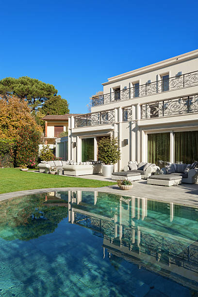 istock beautiful house with pool 503298658