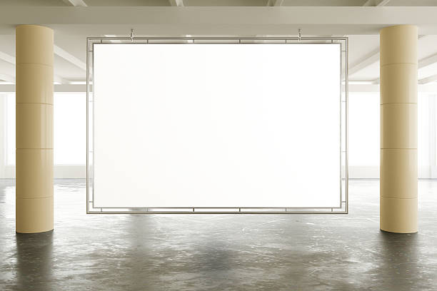 istock Blank banner in sunny spacious hangar area with concrete floor, 503298872