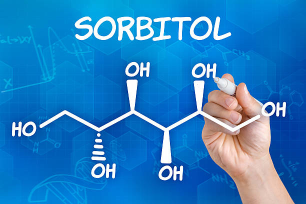 istock Hand with pen drawing the chemical formula of sorbitol 503301196