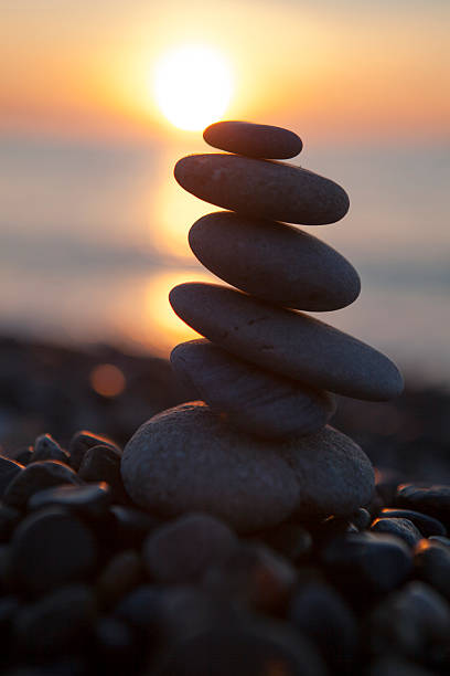 istock stones on the beach, sun, sea, sunset 503301362