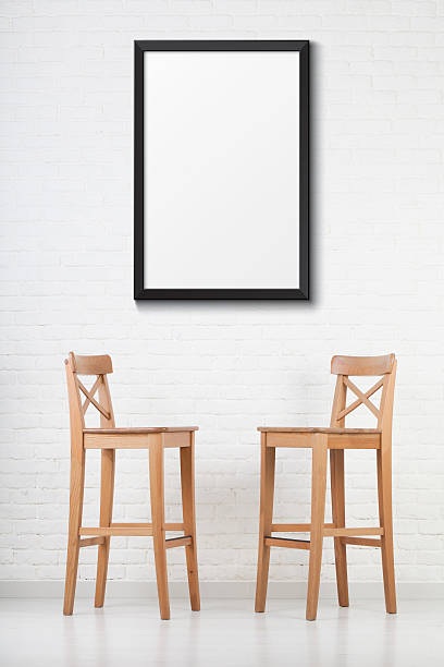 istock Two chairs infront of a wall 503301742