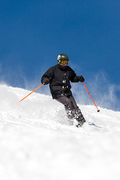 istock Skier skiing on ski slope 503303590