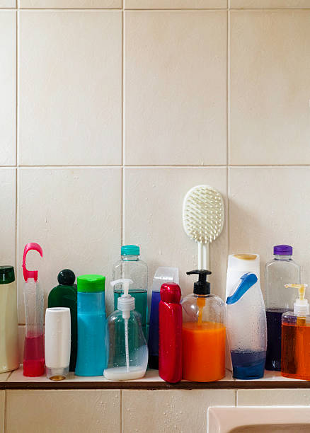 istock Many shampoo and soap bottles on a bathroom shelf. 503307860