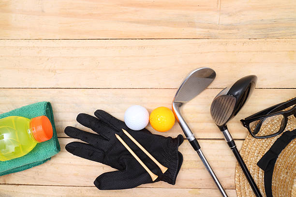 istock Golf equipment on wood floor preparing for good game 503309550