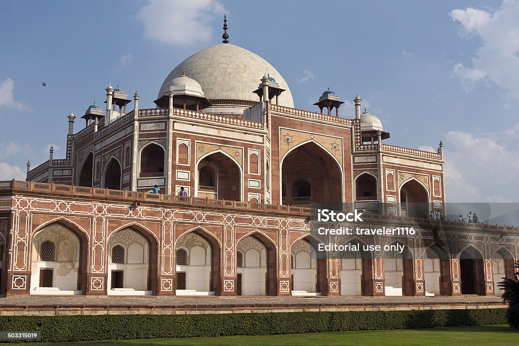 Humayun's Tomb In Delhi, India New Delhi, India - February 7, 2014:  The UNESCO World Heritage Site of Hamayun's Tomb in New Delhi, India with tourists visiting. Architectural Dome Stock Photo