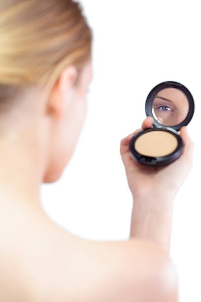 istock Sensual blonde model holding cosmetics 503318251