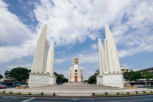Democracy monument on the bright clear sky day in the centre of Bangkok, Thailand