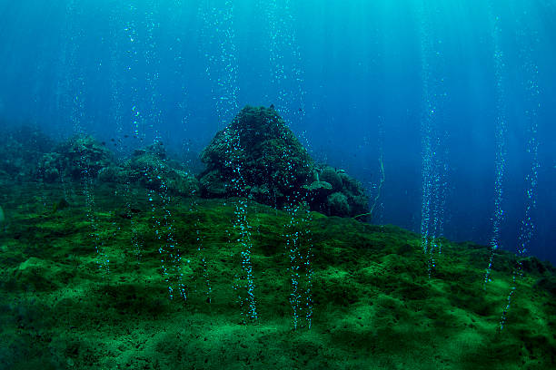 Bubbles A volcanic area in Indonesia volcano stock pictures, royalty-free photos & images