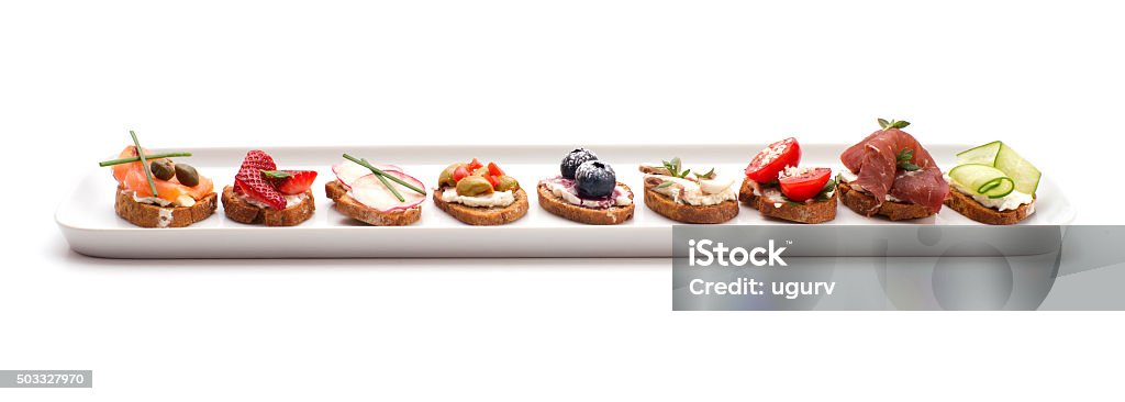 small crostini dish isolated on white Food And Drink Industry Stock Photo