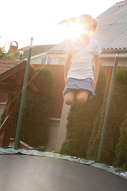 istock Girl is jumping on batut 503328528
