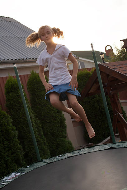 istock Girl is jumping on batut 503328550