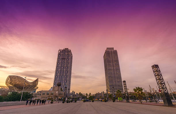 Barcelona, Spain - December 15, 2015:  View from Barcelona Port Olimpic with 2 highest skyscrapers from the city . Hotel Arts and Torre Mapfre