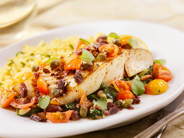 istock Grilled Halibut with Capers,Olives and Tomatoes 503337458