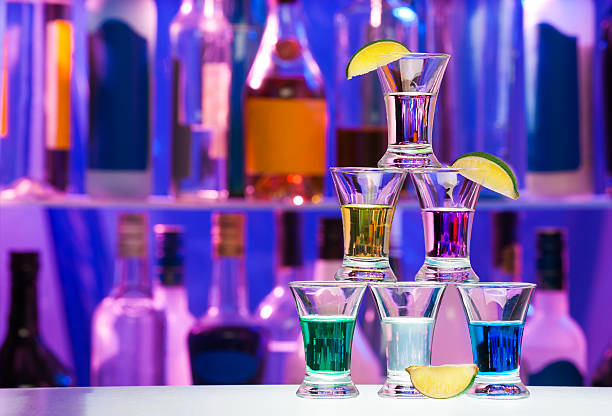 istock Pyramid of shot glasses with drinks and lime 503338742