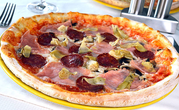 istock pizza with ham and salami 503339135