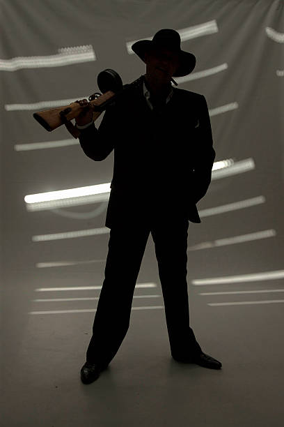 istock Businessman with a gun 503341727