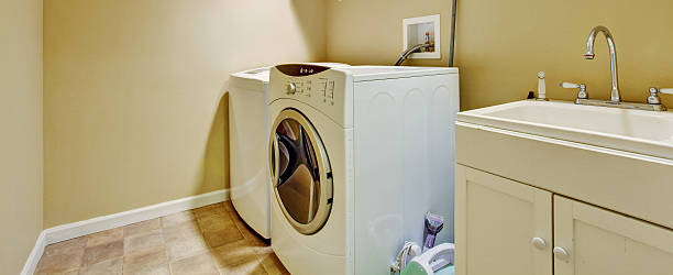 istock Laundry room with old cabinet and modern appliances 503343575
