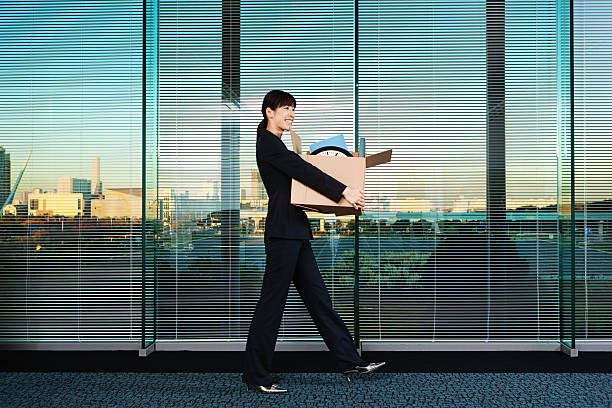 New Young Woman Employee Moving into Her Office +++ From Tokyo Lypse +++ office leave stock pictures, royalty-free photos & images