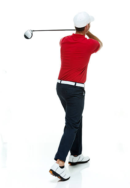 istock Rear view of athlete golf swinging 503344029
