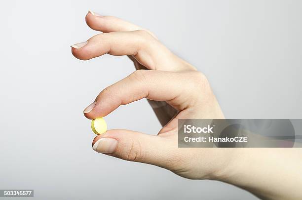 Pill In Hand Stock Photo - Download Image Now - Adult, Aspirin, Beautiful Woman