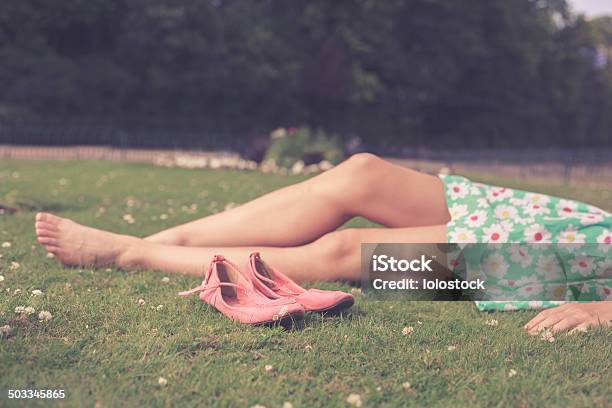 Bare Legs Of A Woman In The Park Stock Photo - Download Image Now - Adult, Adults Only, Beautiful People