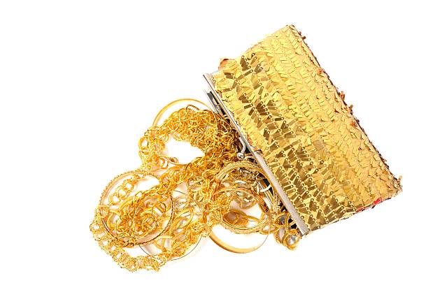 istock Golden jewels on white 503353230