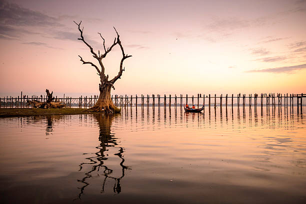 U Bein Bridge U Bein bridge of Mandalay, Myanmar. u bein bridge stock pictures, royalty-free photos & images