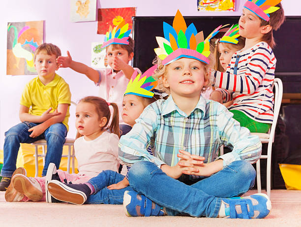 istock Little blond boy with Indian handmade headwear 503354652