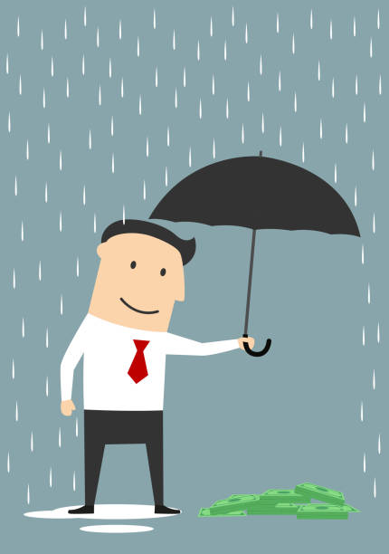 istock Businessman protecting money with umbrella 503359590
