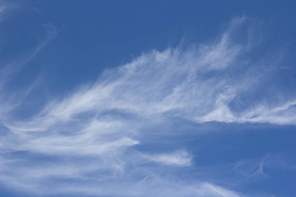 istock white fluffy clouds in the blue sky 503364936