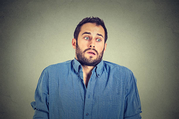 istock handsome man shrugging shoulders showing ignorance 503367838