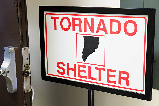 Tornado Shelter Sign Tornado shelter sign on the airport. wind shelter stock pictures, royalty-free photos & images