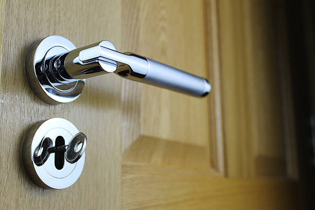 istock Wooden Door with Chrome Handle and Key C 503372157