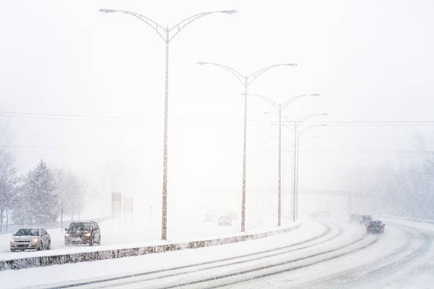istock Disturbing Sunset Light and Snowstorm on Highway 503373273