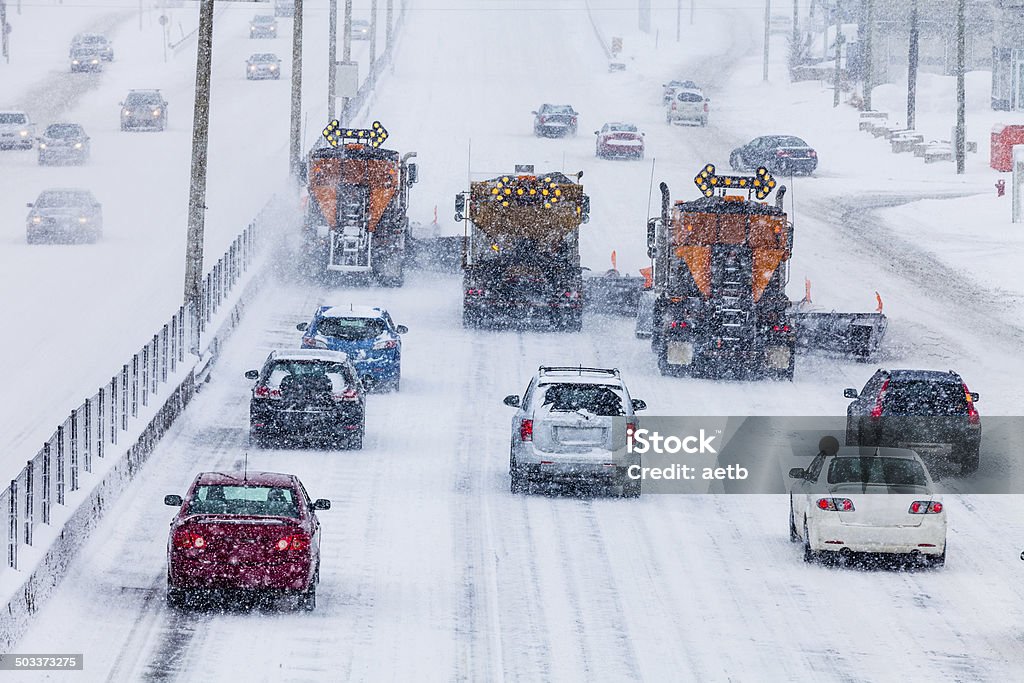 Tree Lined-up Snowplows Clearing the Highway Tree Lined-up Snowplows Removing the Swno the Highway on a Cold Snowy Winter Day Snowplow Stock Photo