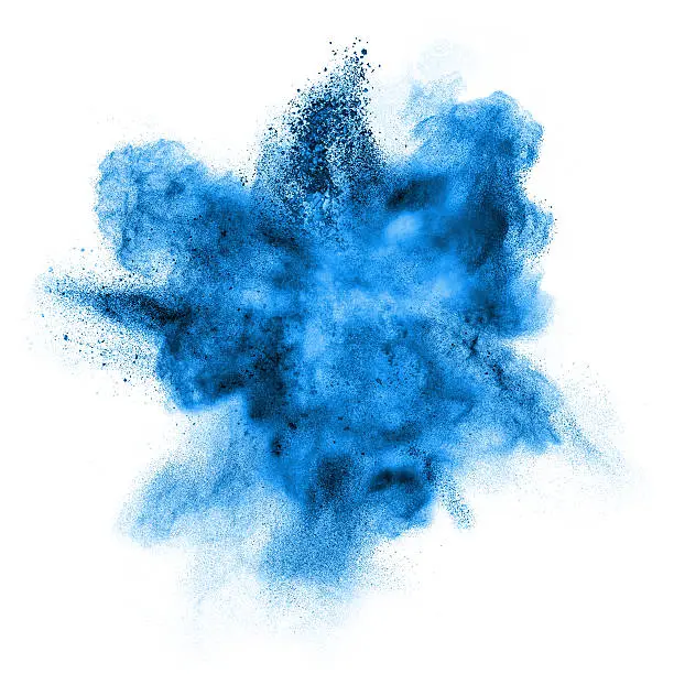 Photo of blue powder explosion isolated on white